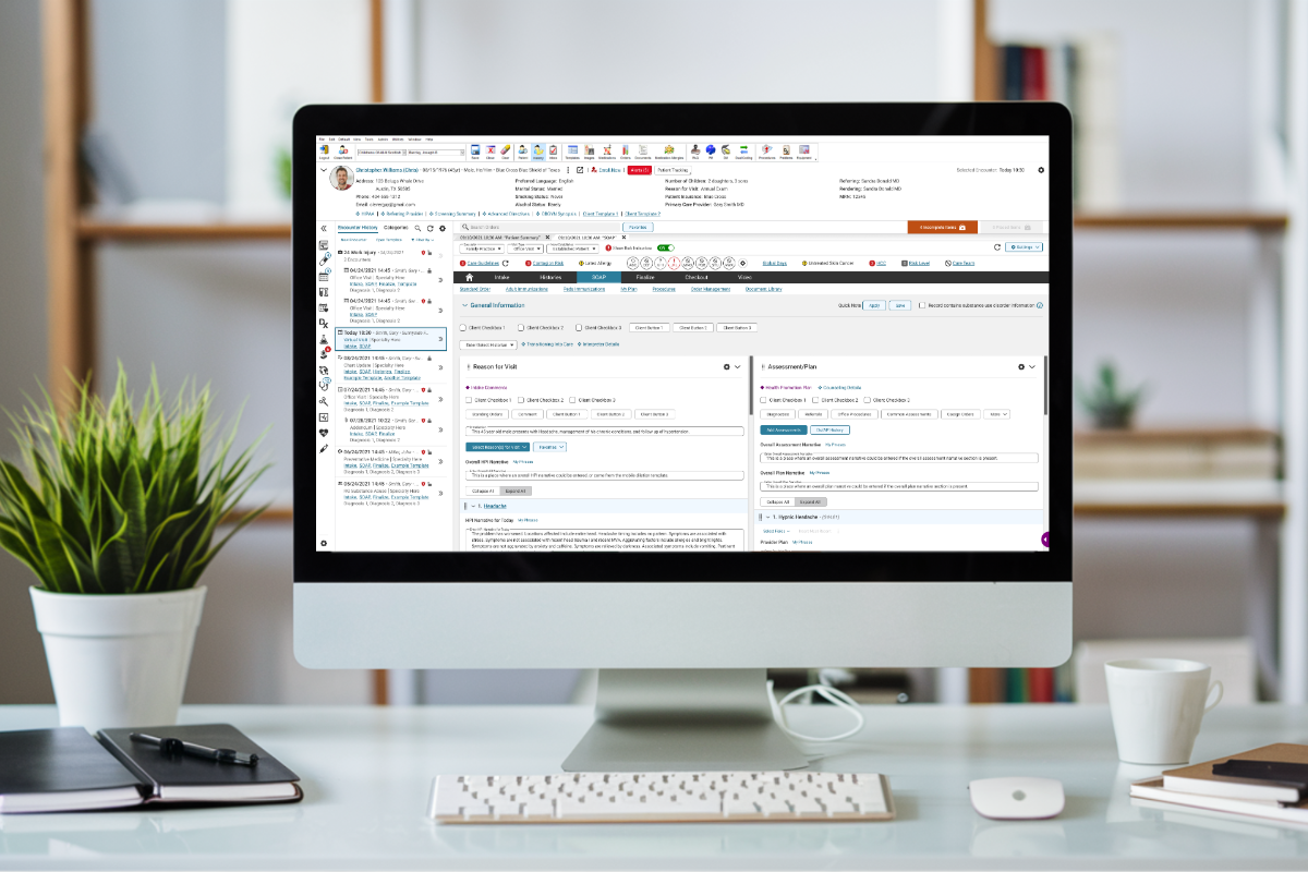 Computer on a desk showcasing the SOAP screen within the enterprise EHR.